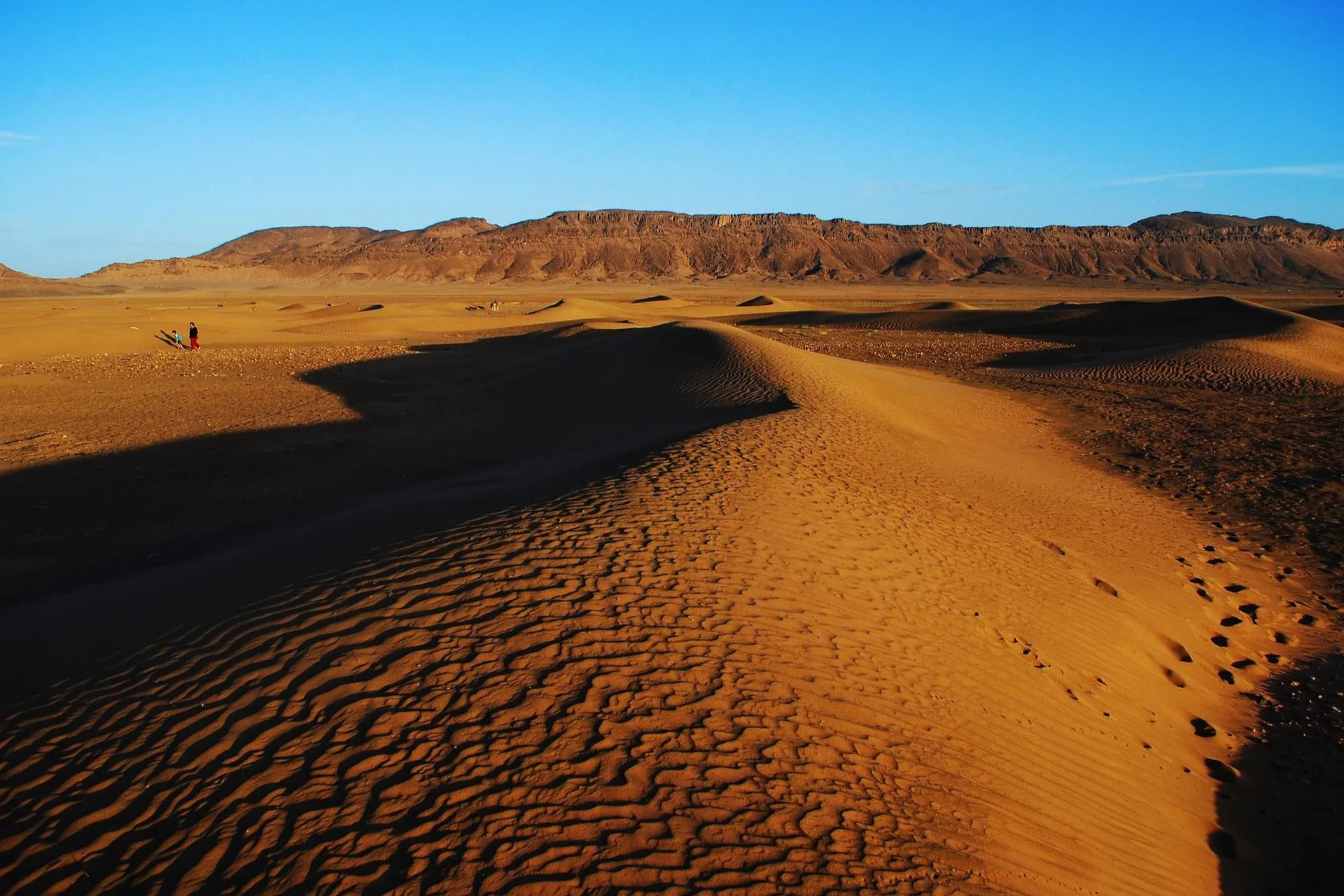 Sand Dunes landscape with Mountains of Zagora, Morocco