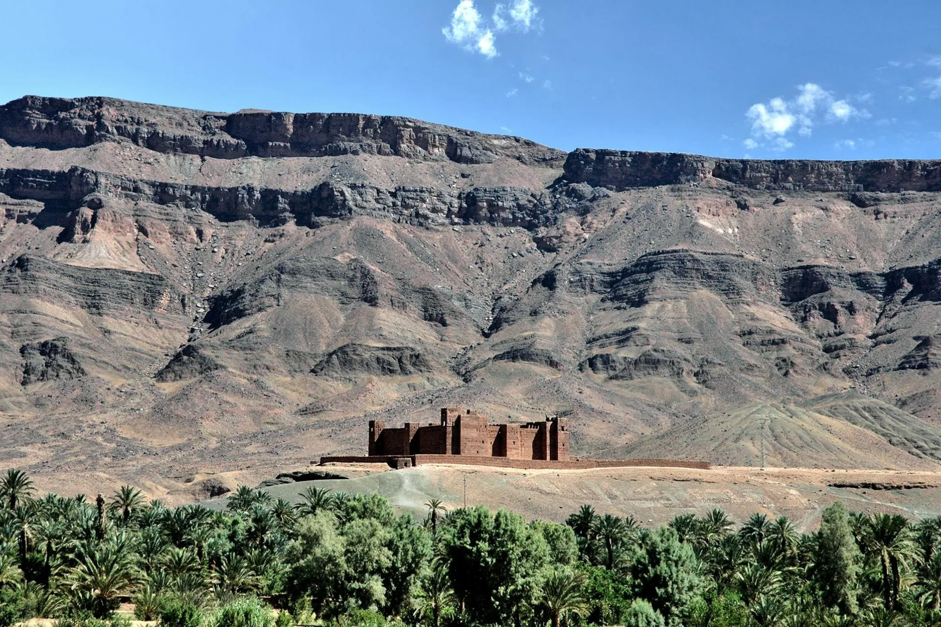 Majestic Kasbah in Zagora Against Rocky Mountain Backdrop, Morocco