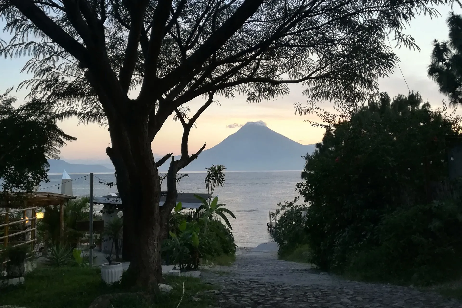 View of Lake Atitlán from a Panajachel cobblestone street, Guatemala