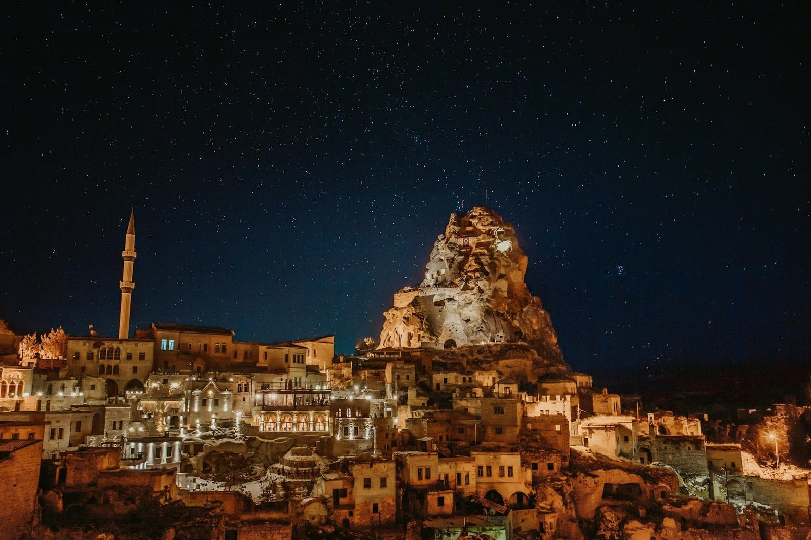 Uchisar Castle & City Buildings During Night Time in Göreme, Türkiye