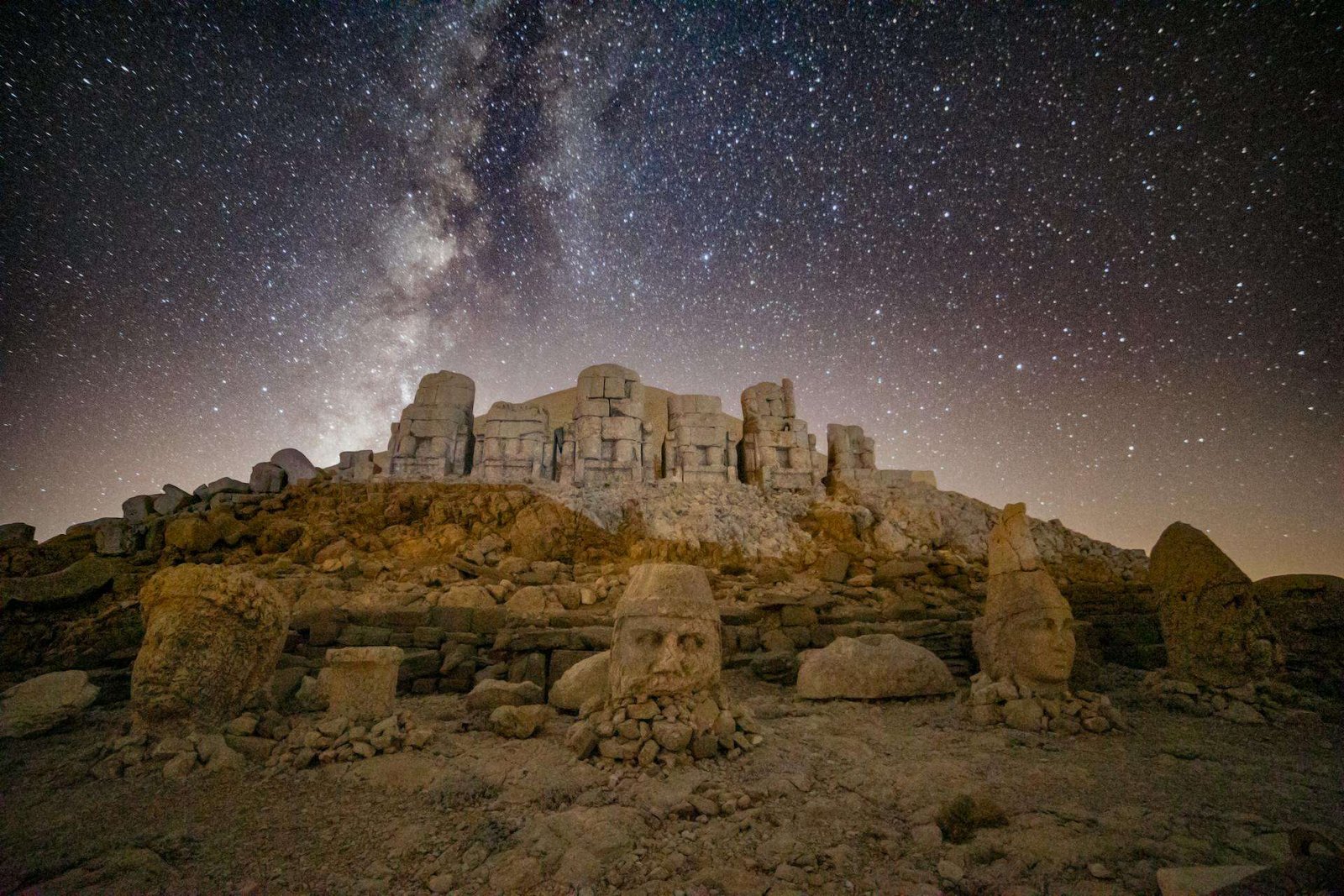 Ancient Statues on the Nemrut Mountain under a Starry Night Sky, Nemrut, Türkiye